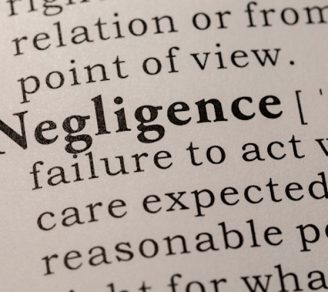 Close up of the definition of negligence
