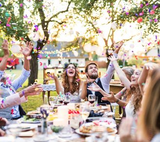 The wedding reception with the guests all around a table
