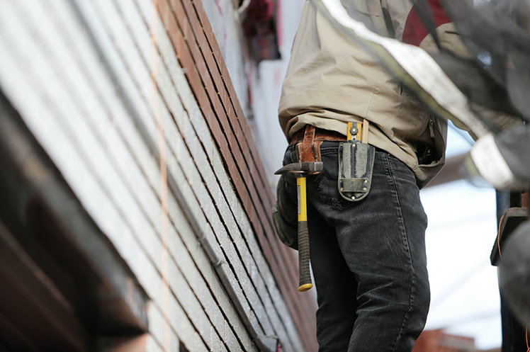 Cropped image of a contractor at work