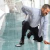 A man slips and falls at work