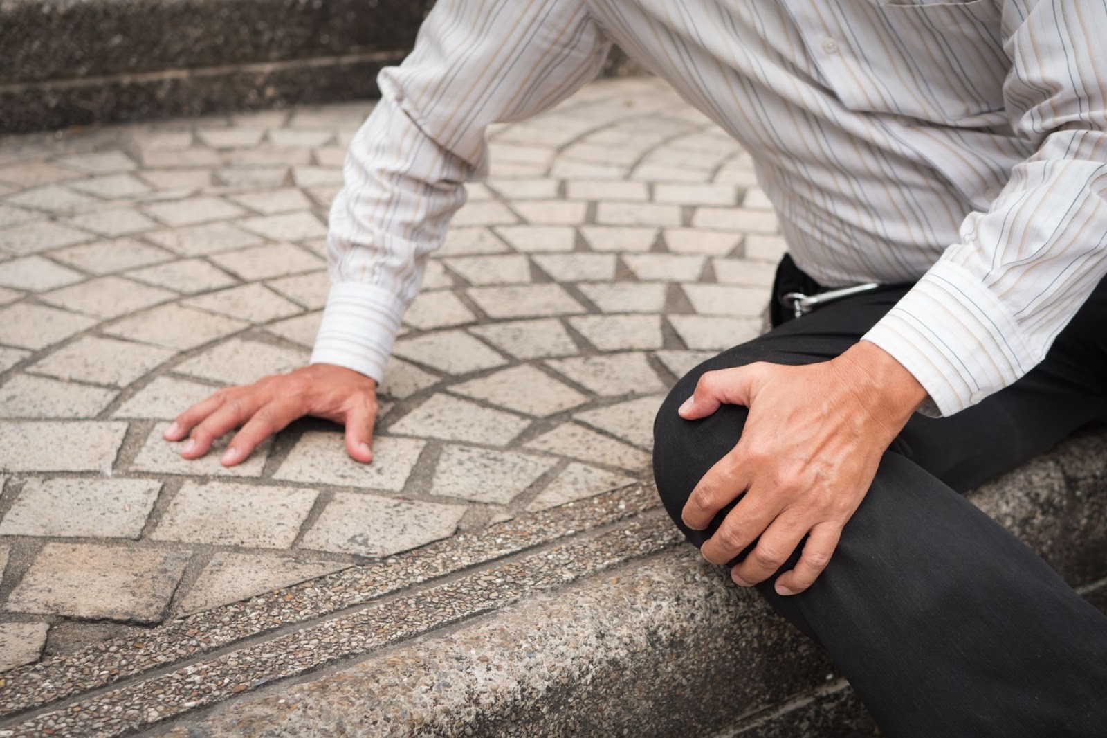 A man slipping on stairs
