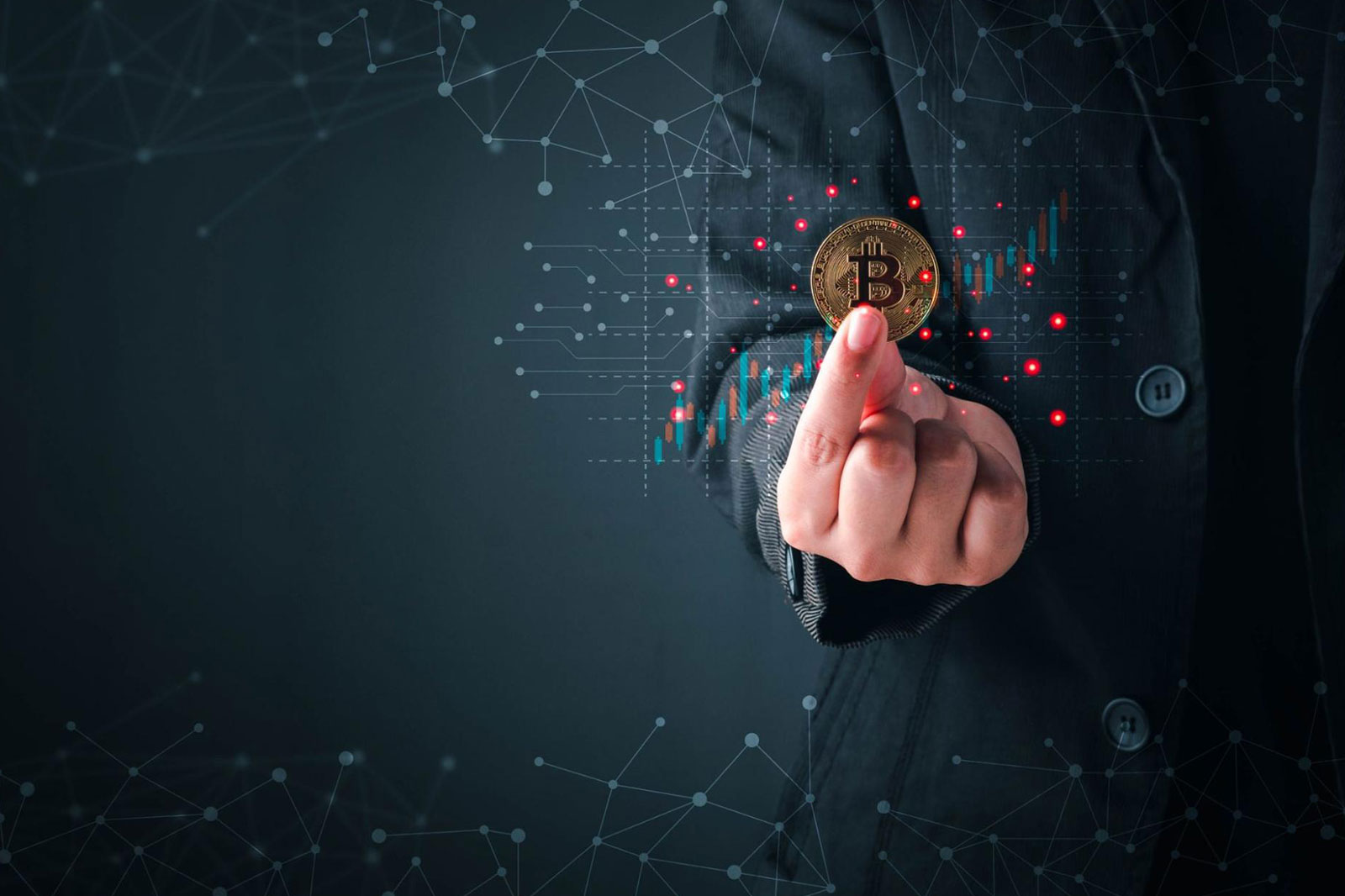 Cropped image of a man in a suit, holding a bitcoin