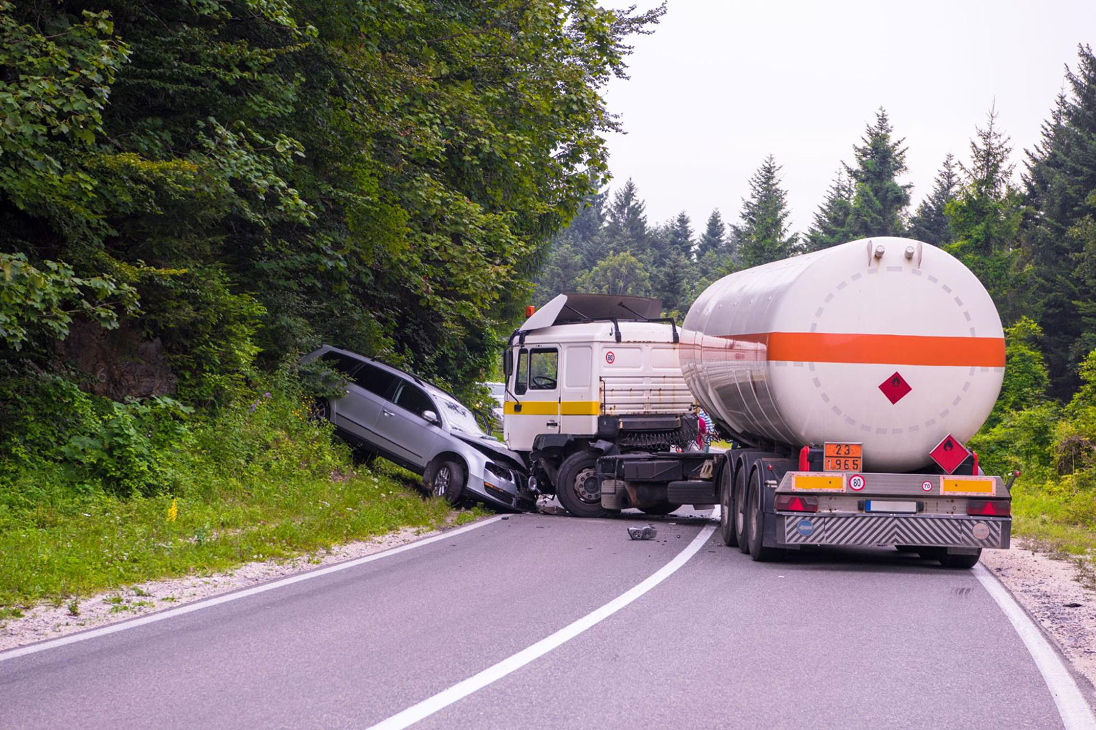 A truck colliding with a car