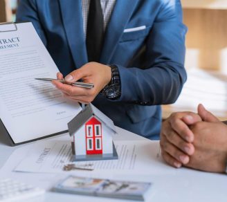 A business owner explaining contractor insurance coverage to a client