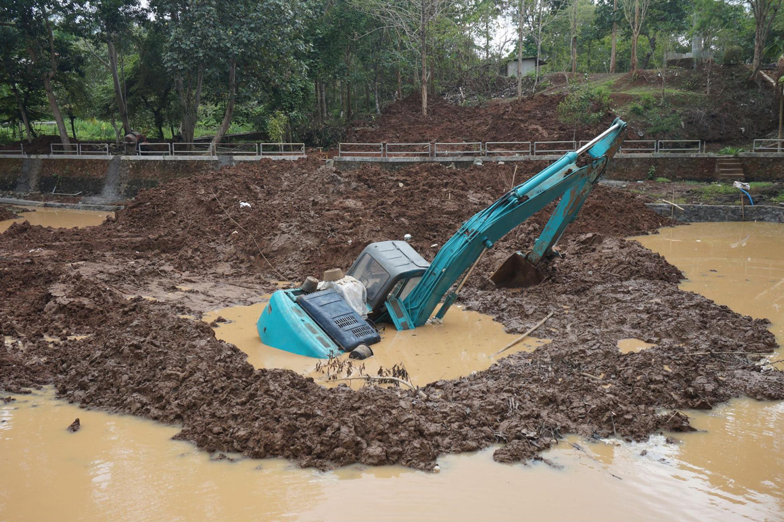  Construction equipment that was mistakenly driven into flooded grounds and sustained damage