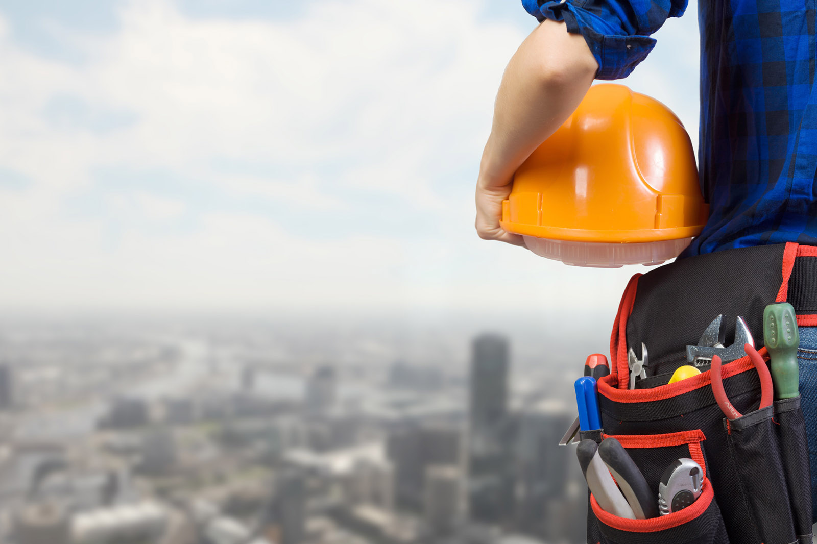 A contractor overlooking the city 