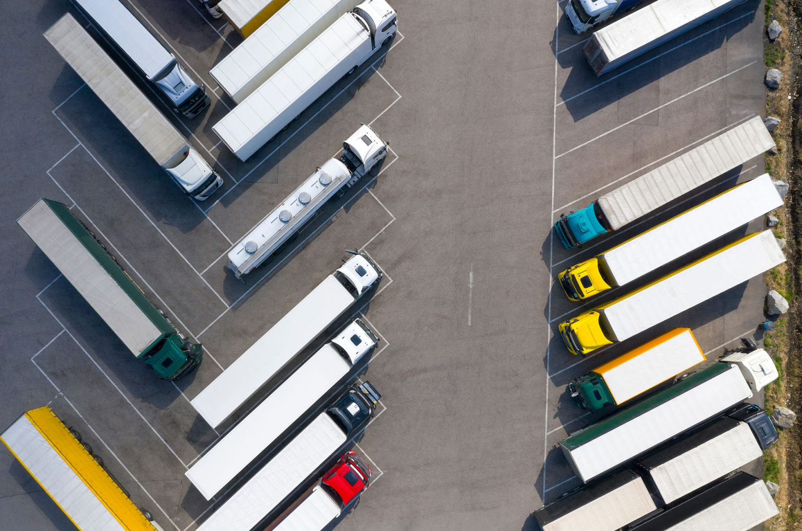 A parking lot full of trucks