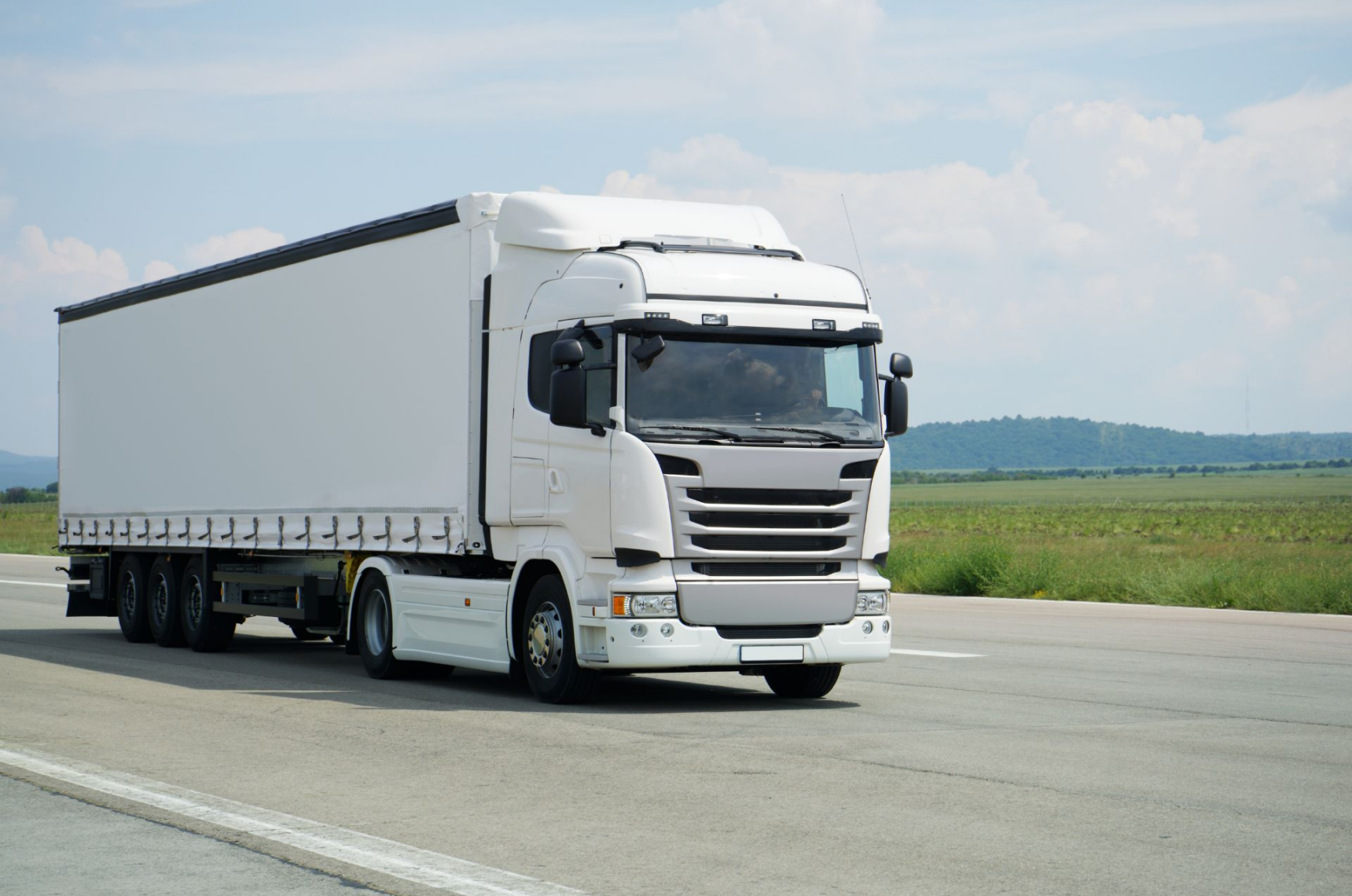 A truck driving on a highway