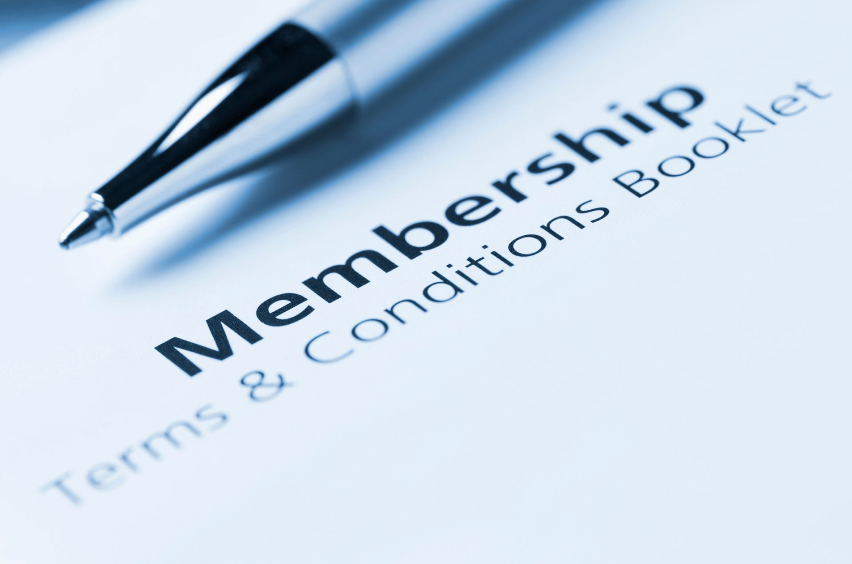 A close-up of the word “membership” in a terms and conditions booklet 