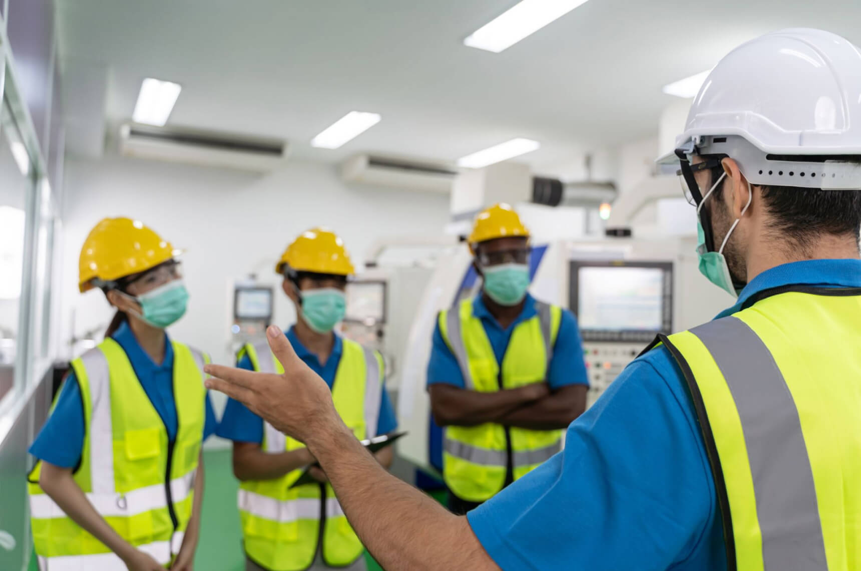 Four contractors having a meeting in an office
