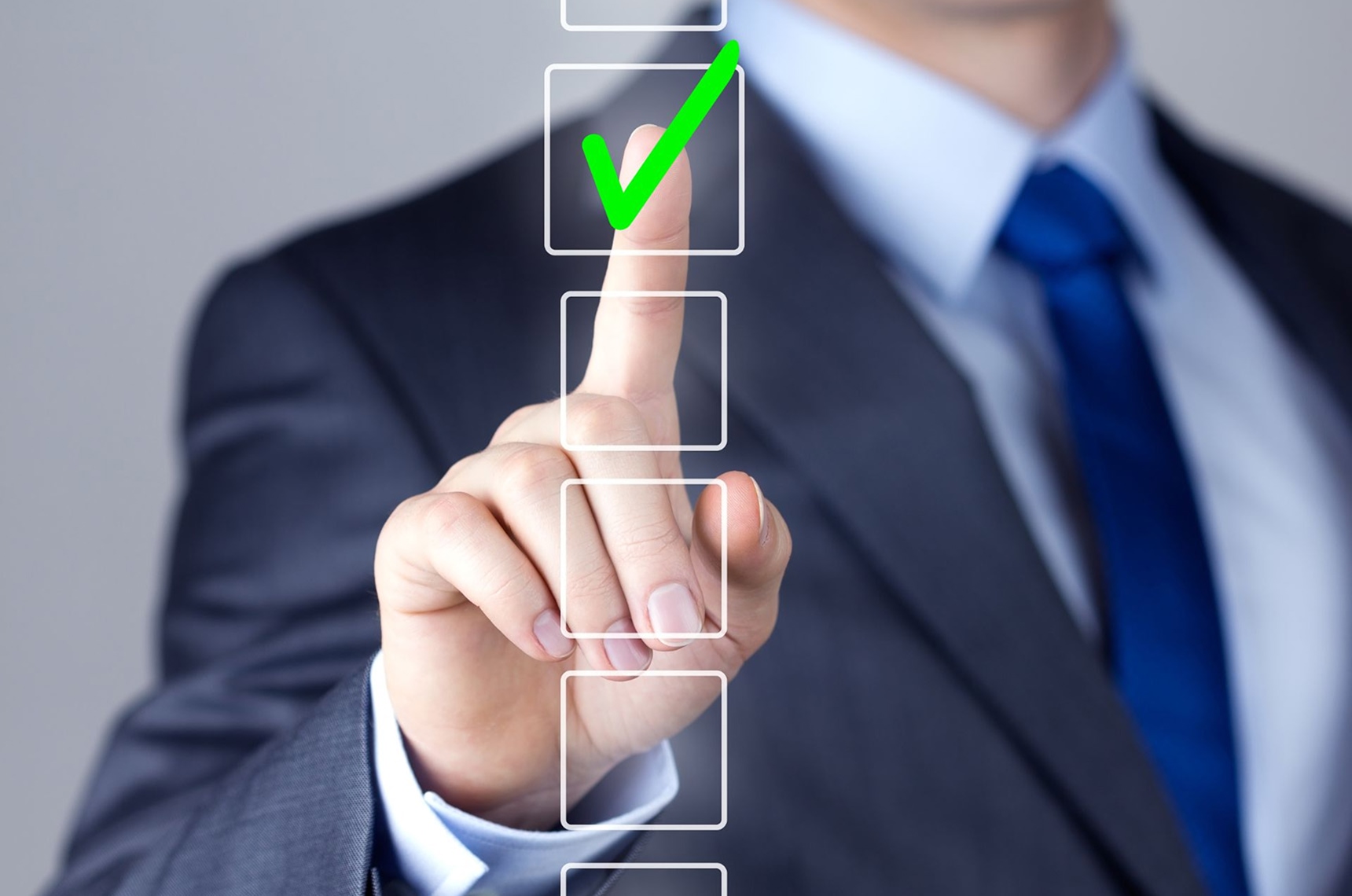 Businessman making the right decision touching a screen interface